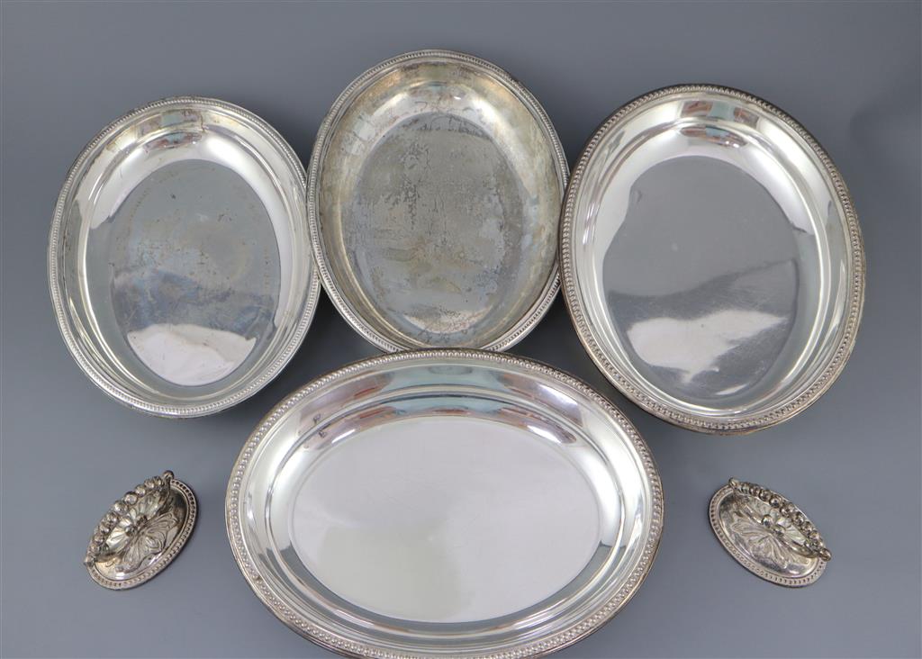 A pair of late Victorian silver oval entree dishes and covers with handles, by Mappin & Webb,